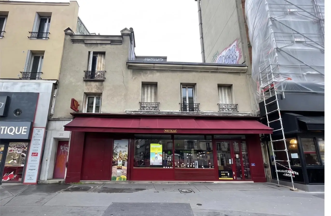 Avant — façade dégradée avant isolation